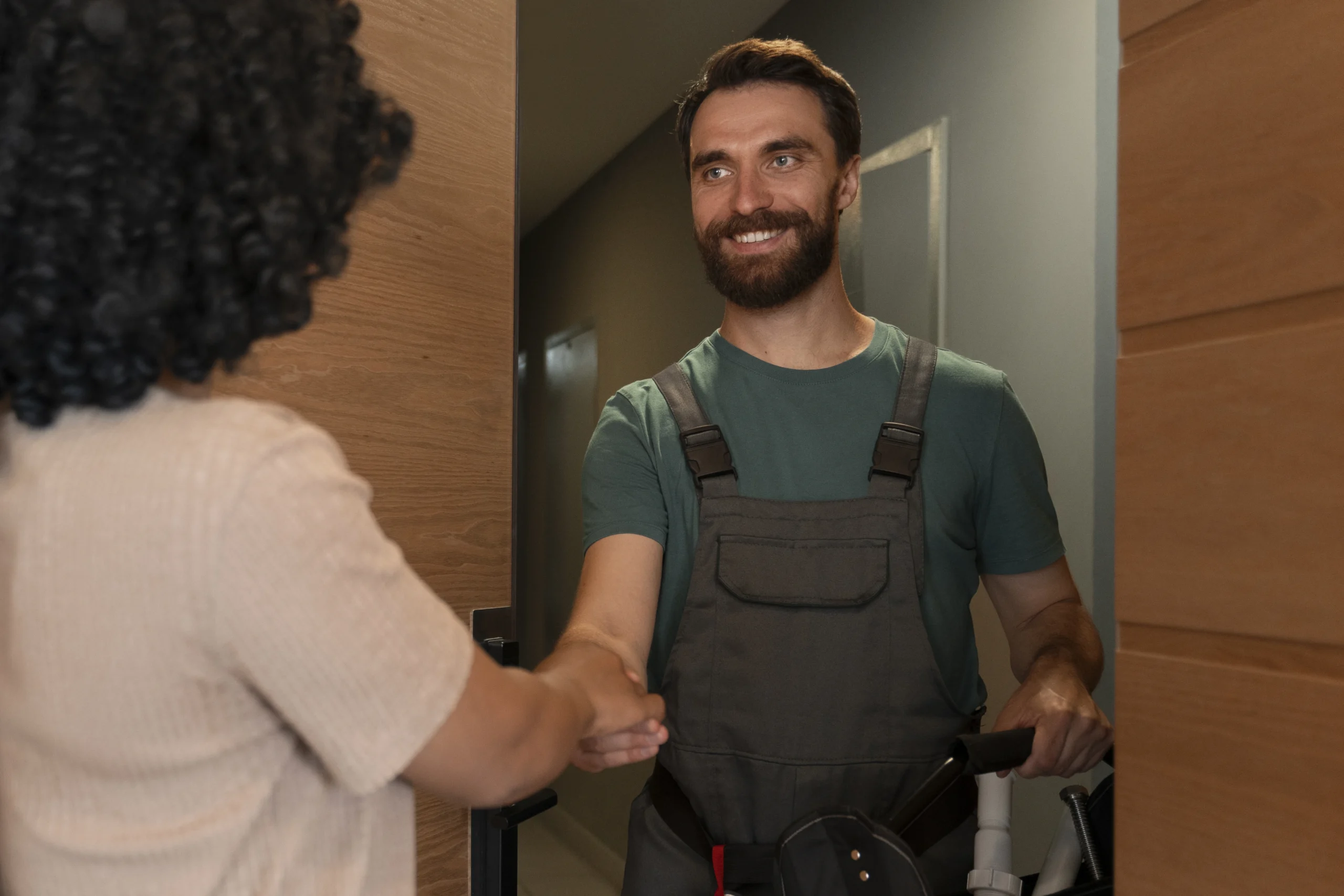 What Maintenance Does a Holiday Rental Property Need? 2 side-view-man-working-as-plumber